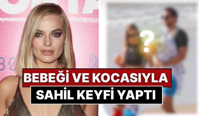 gul-yuzunu-dogumdan-sonra-birinci-kere-gorduk-margot-robbie-kocasi-ve-bebegiyle-kiyi-yuruyusunde-iIZChNFy.jpg